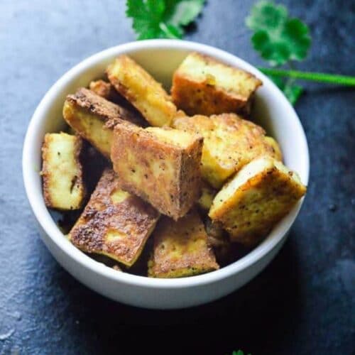 Cooked tofu in white bowl