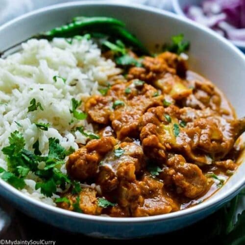 Cauliflower tikka masala dish in bowl