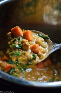 Cooked vegan curry with chickpeas and sweet potatoes