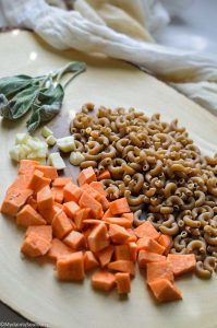 Ingredients of mac and cheese with buttenut squash