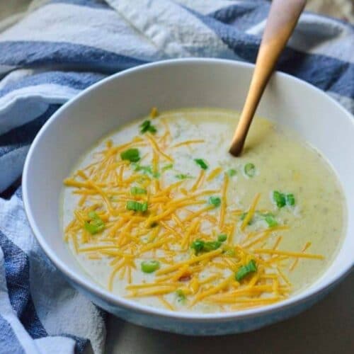Cauliflower soup in white bowl