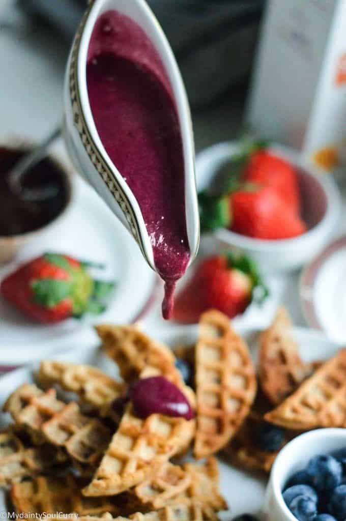 Berry compote sauce over waffle churros