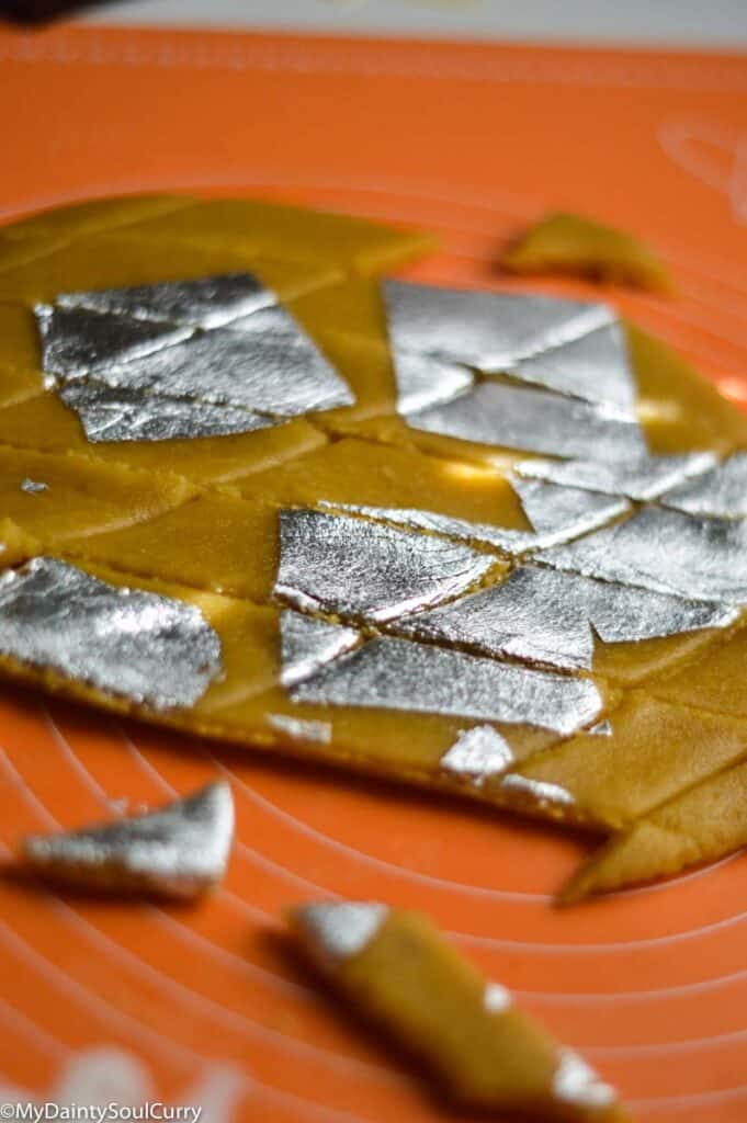 rolled katli with silver paper