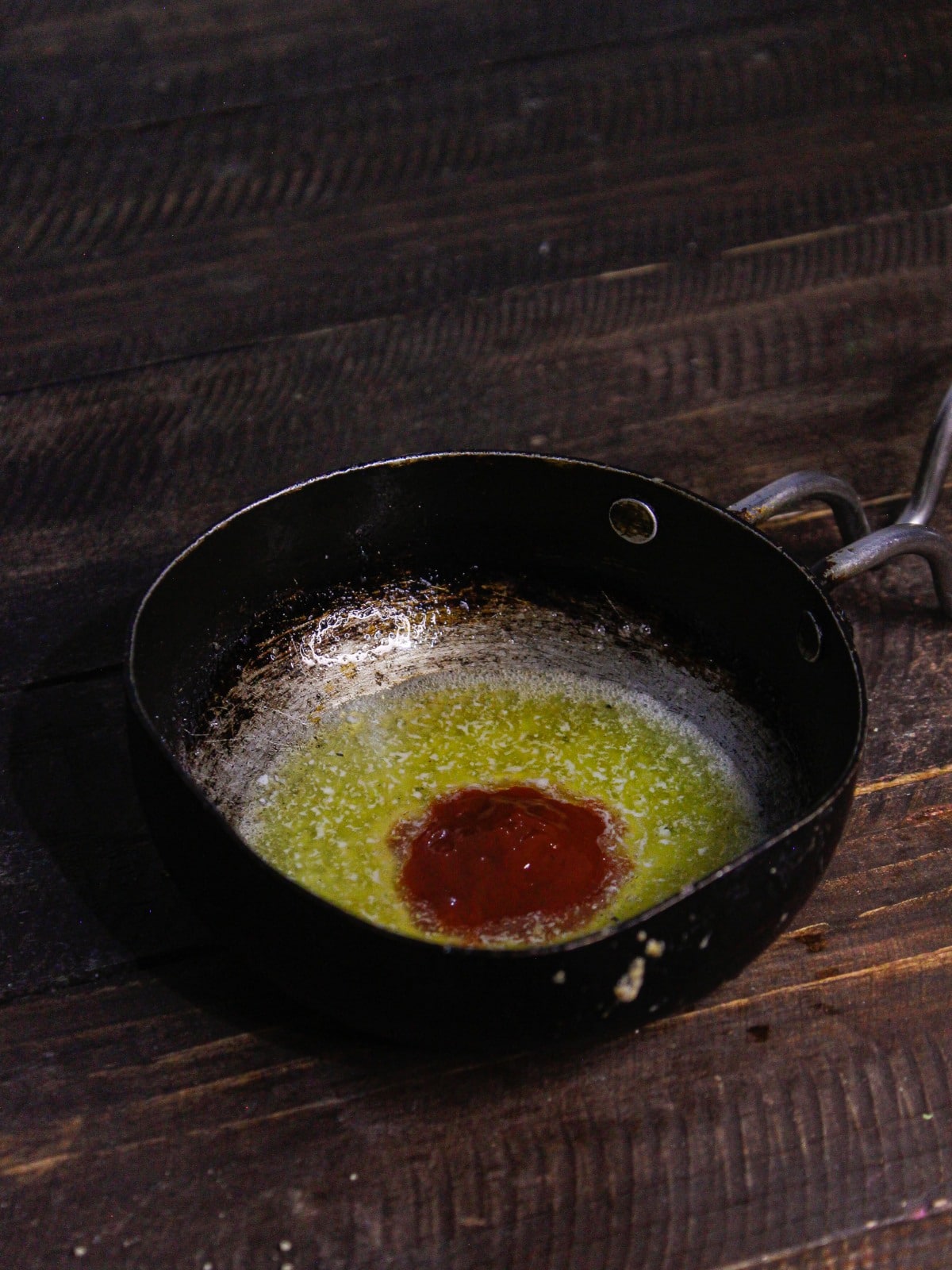 Add butter and sriracha Sause into the pan 