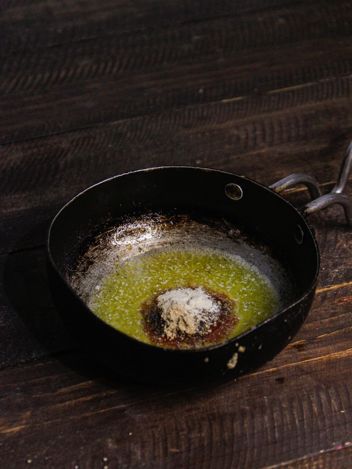 Add onion and garlic powder to the pan