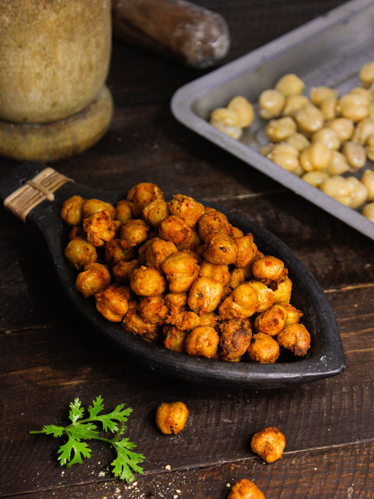 Yummy Air Fryer Crunchy Spicy Chickpeas with boiled chickpeas in the background