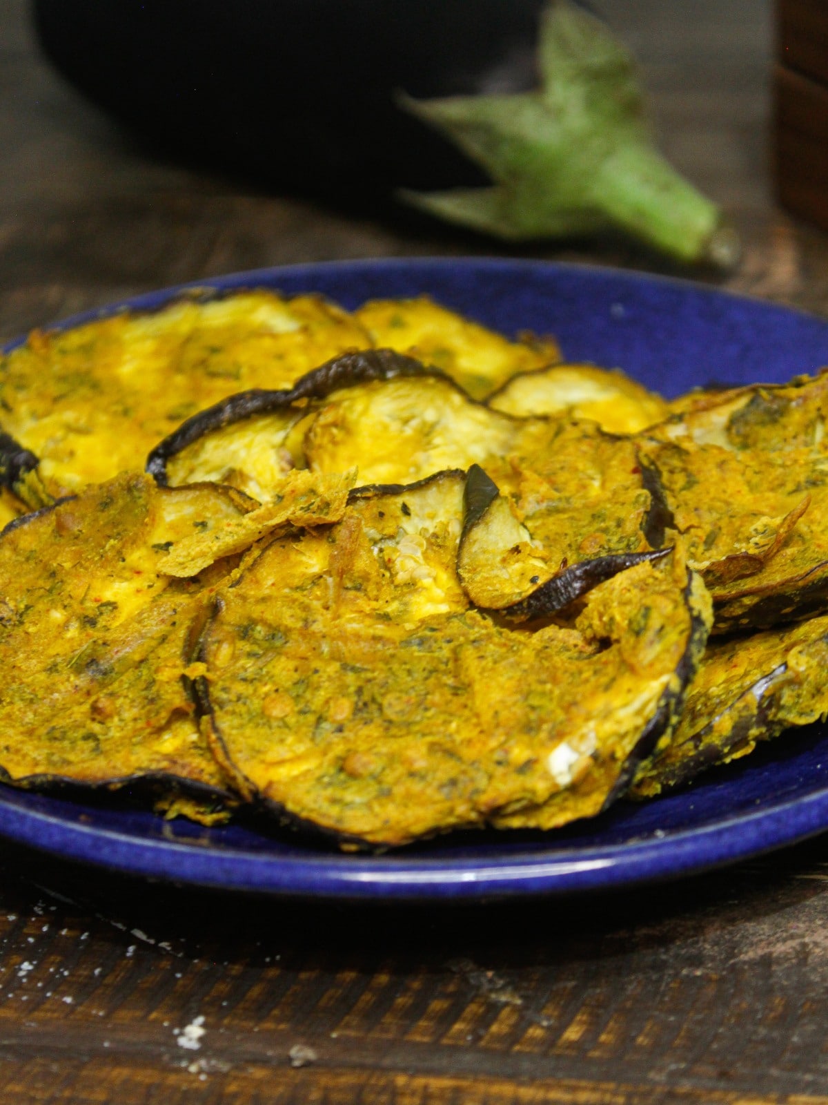 Side view of Begun Bhaja: Crispy Fried Eggplant