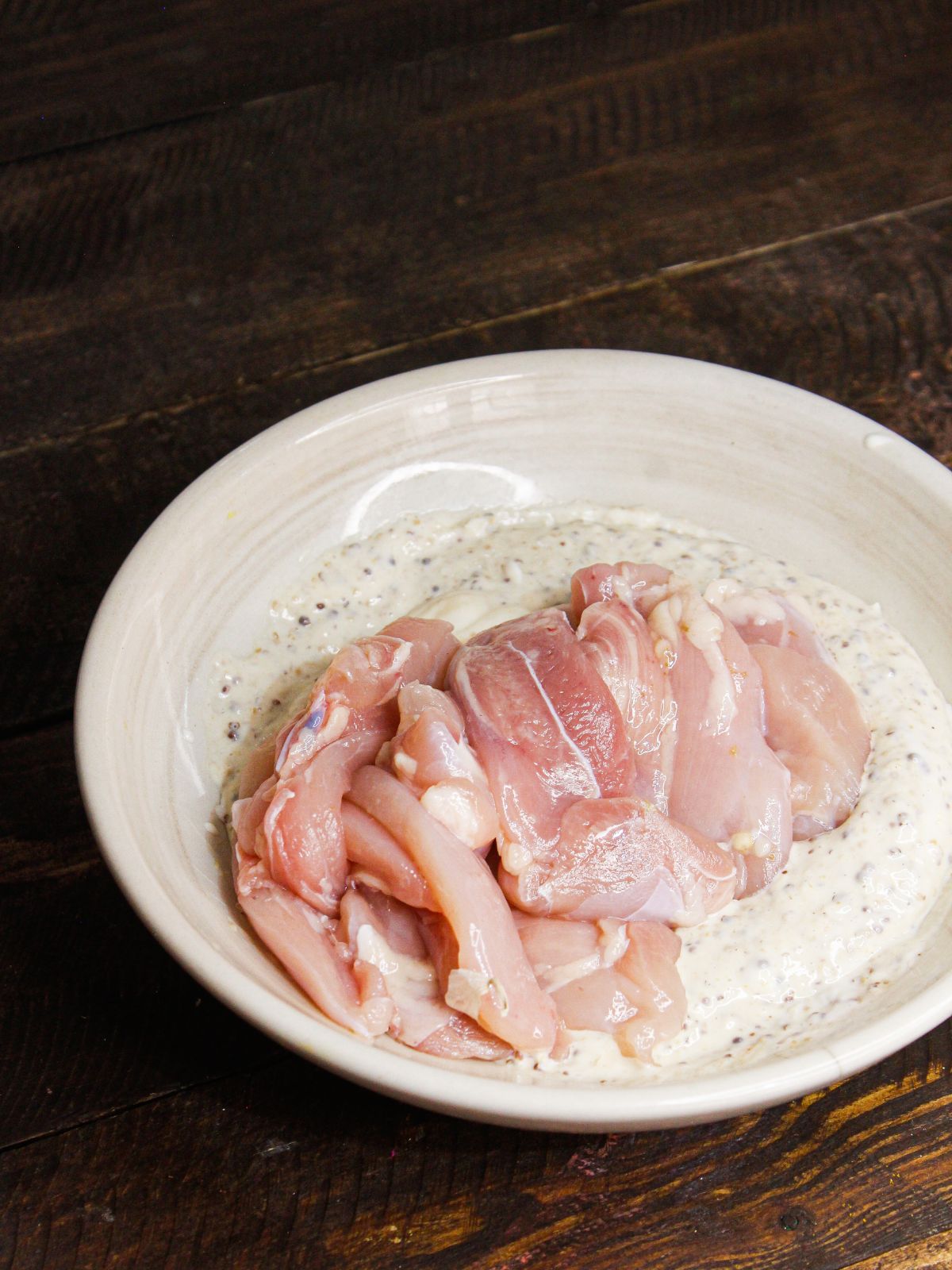 Transfer chicken tenders into the mayo mixture 