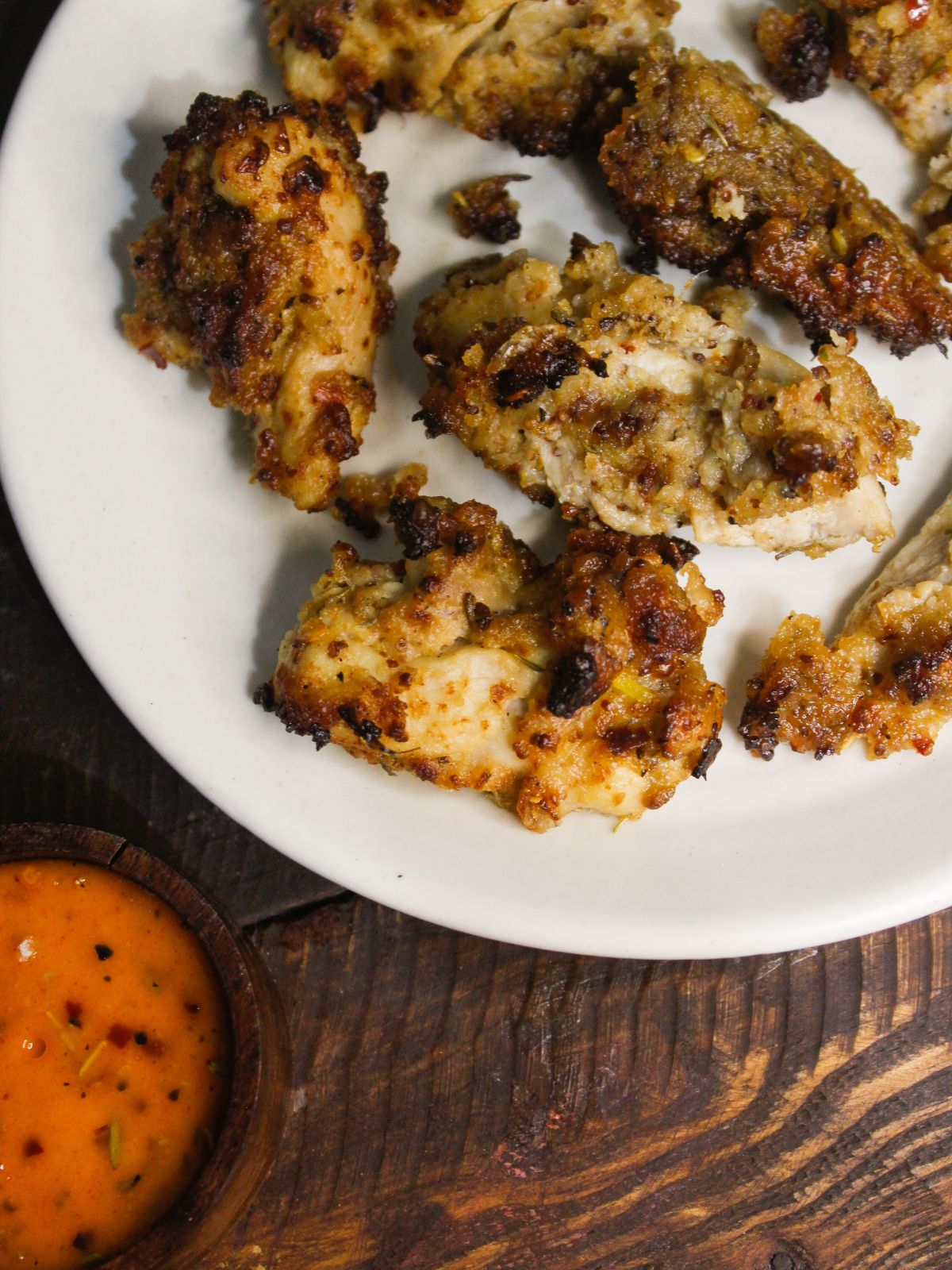 Top view side image of Cheesy Chicken Tenders with Chili Mayo Dip