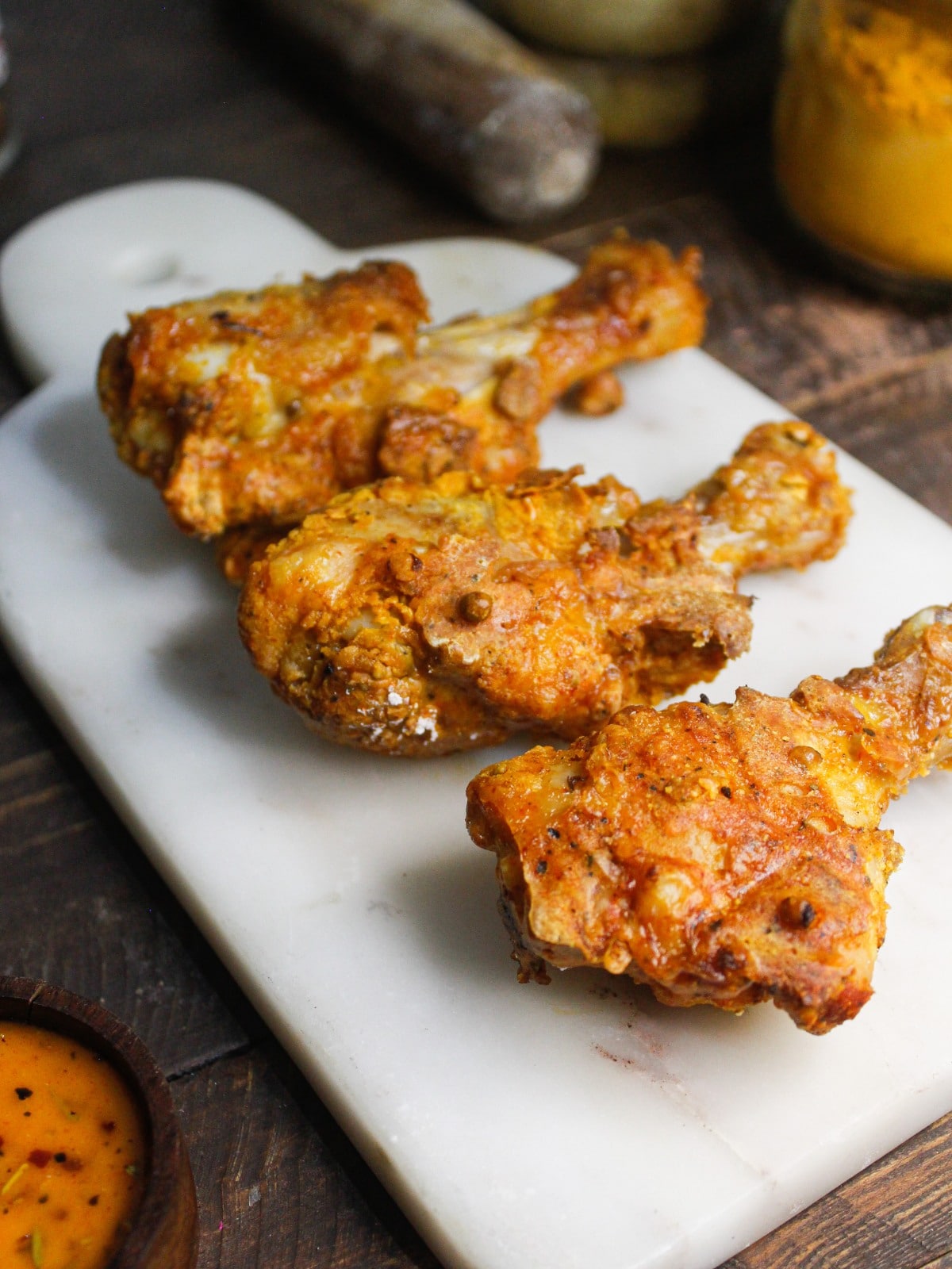 Crunchy Spicy Fried Chicken Drumsticks served with red chutney