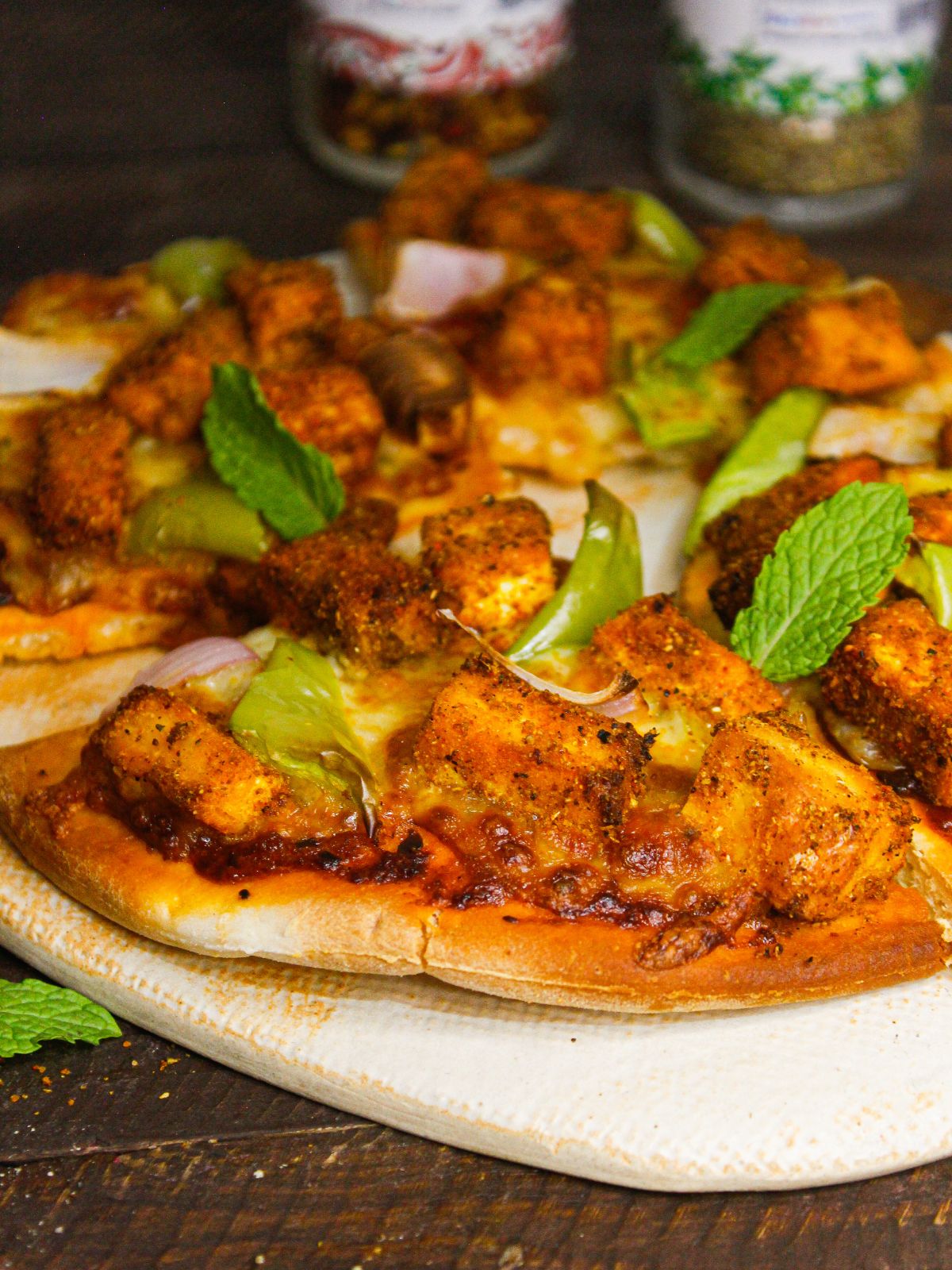 Side view of Tandoori Paneer Pizza