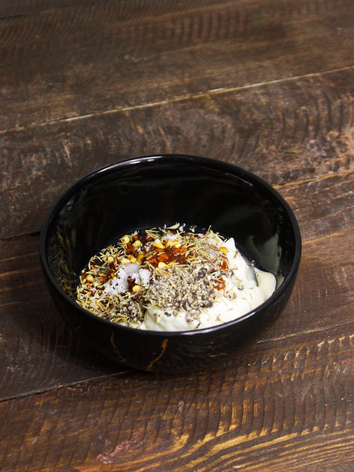 Add Mixed Italian herbs and lemon juice to the bowl