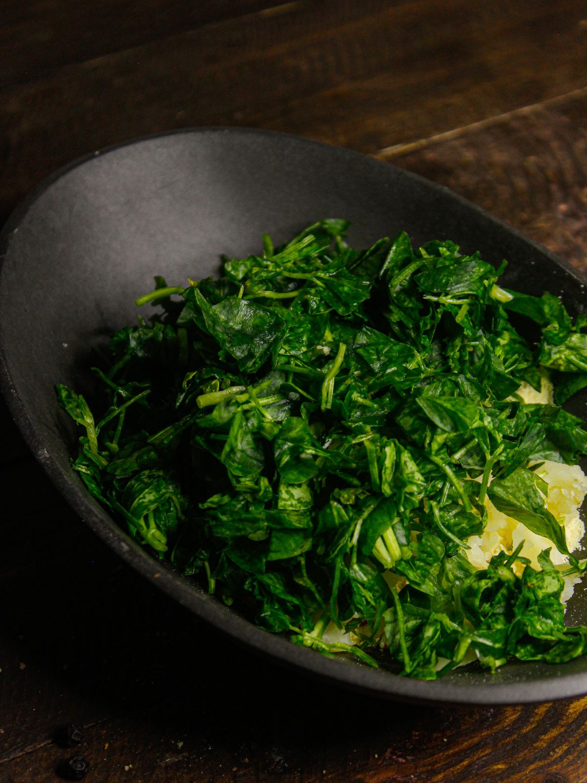 Add chopped Fenugreek leaves to the bowl