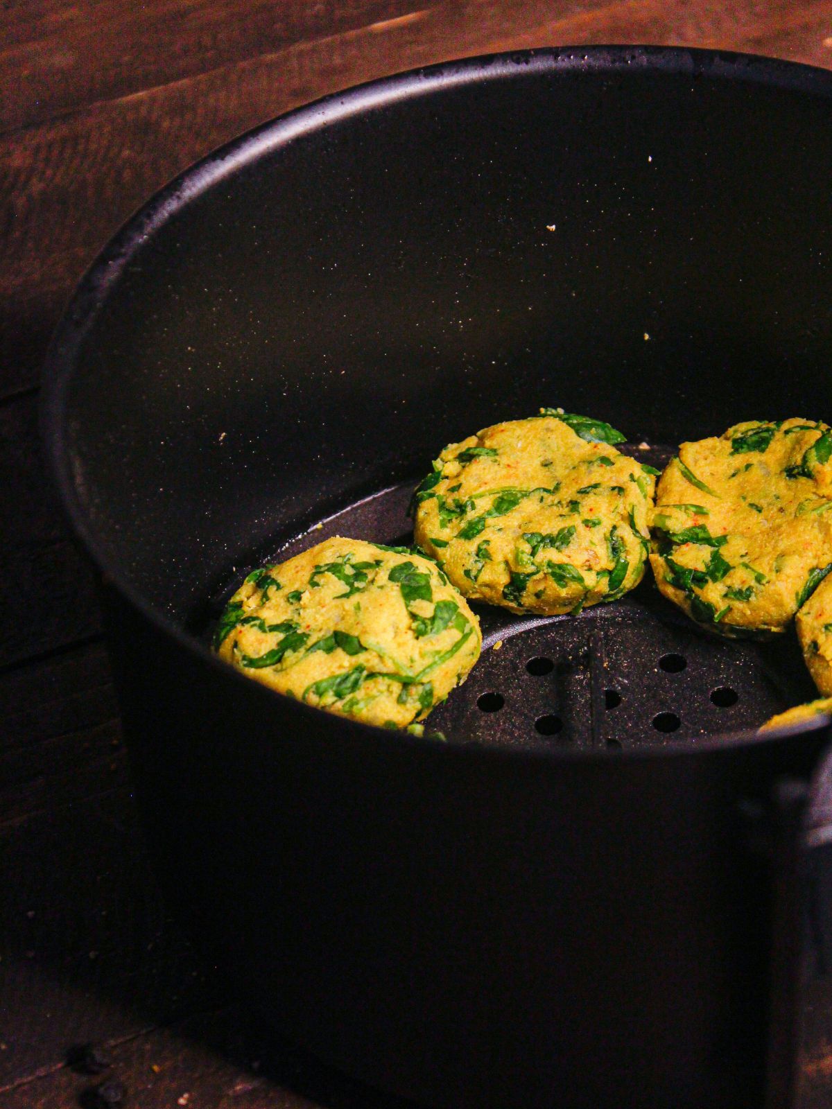 Make small small flat balls and fry it in air fryer 