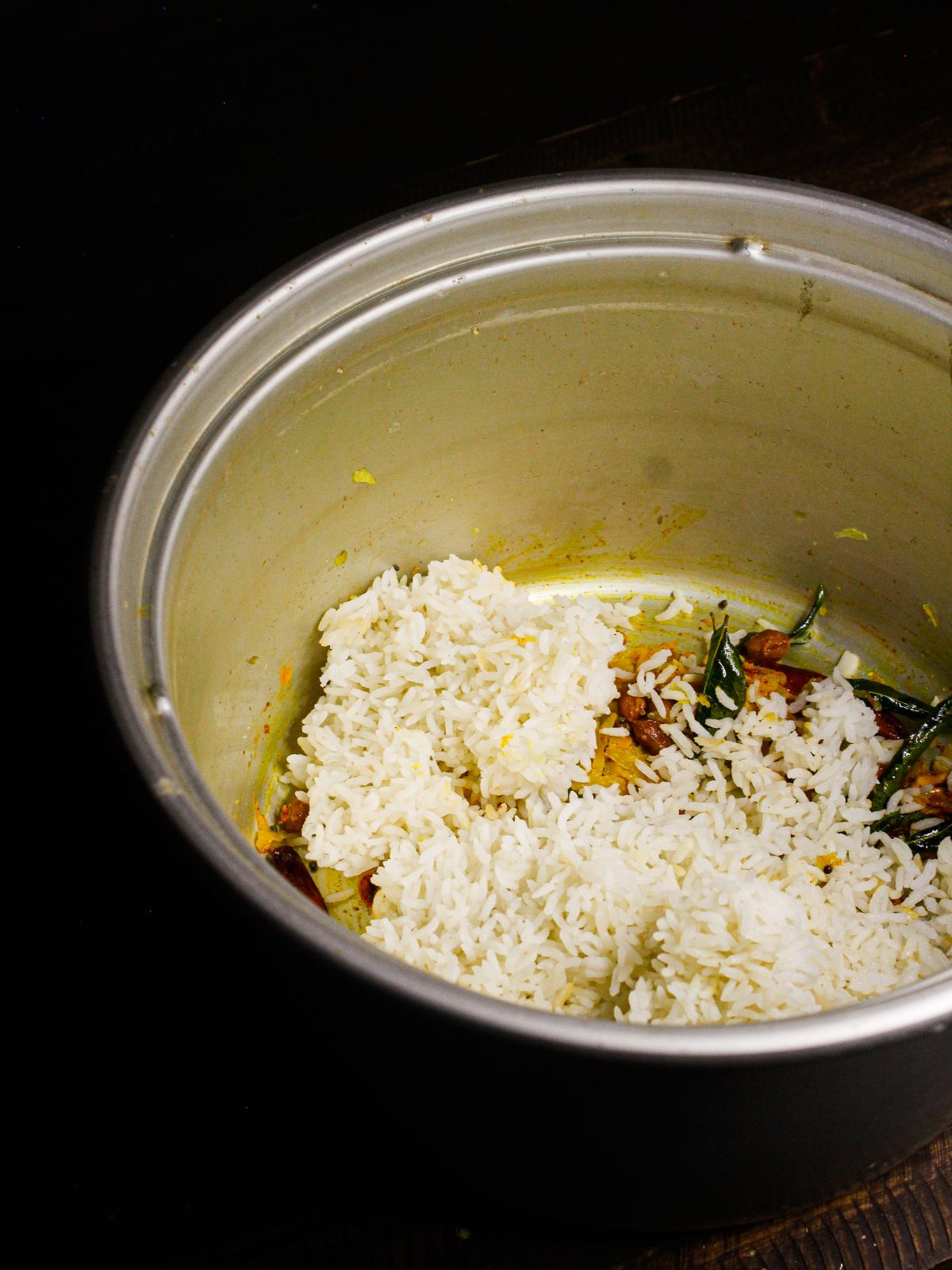 Add cooked rice to the pot