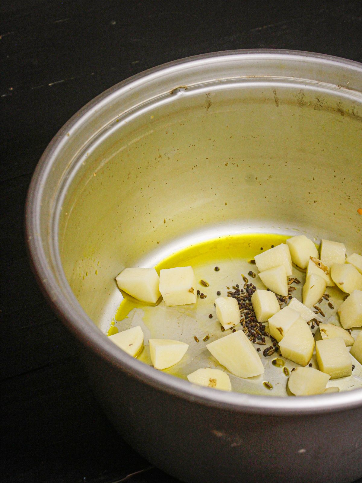 Add cubed potatoes to the pot