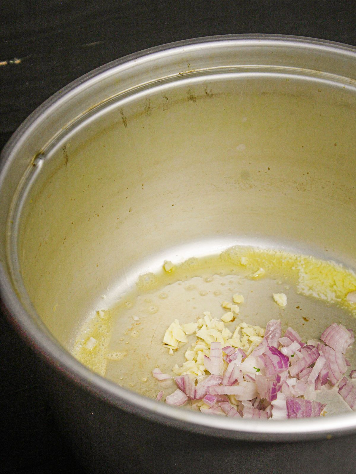 Add chopped onions to the pot