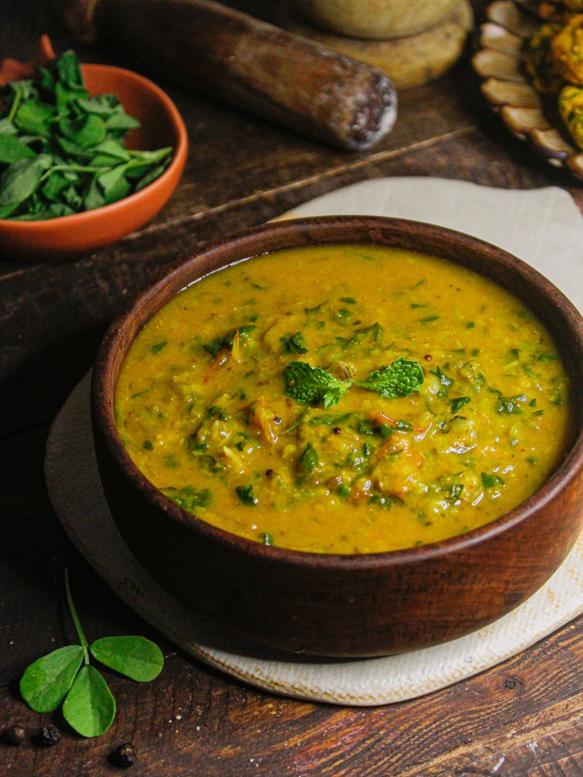 Garnish Instant Pot Fenugreek Dal with some mint leaves and enjoy with roti or rice 