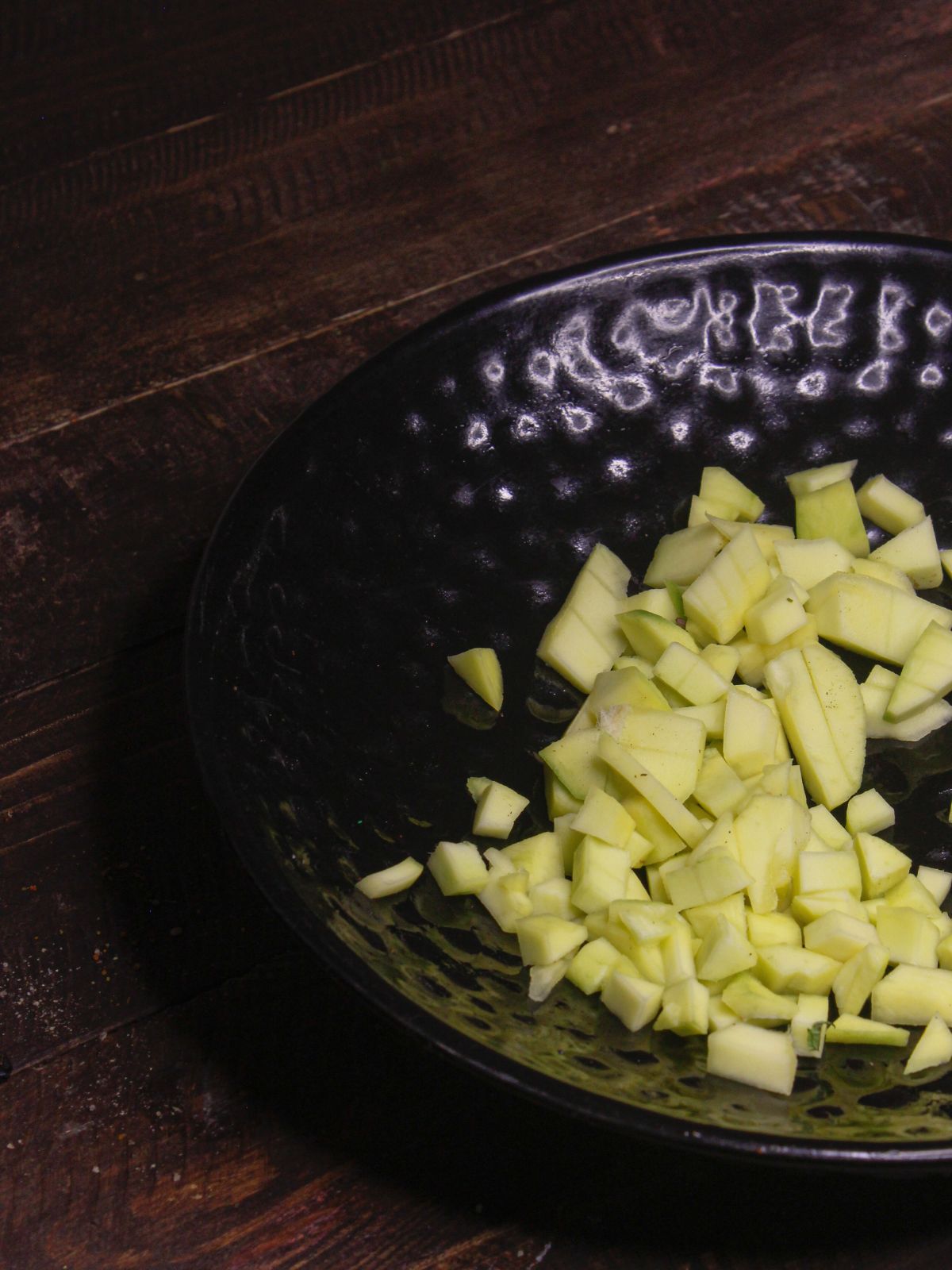 Take Diced Raw mango in a bowl