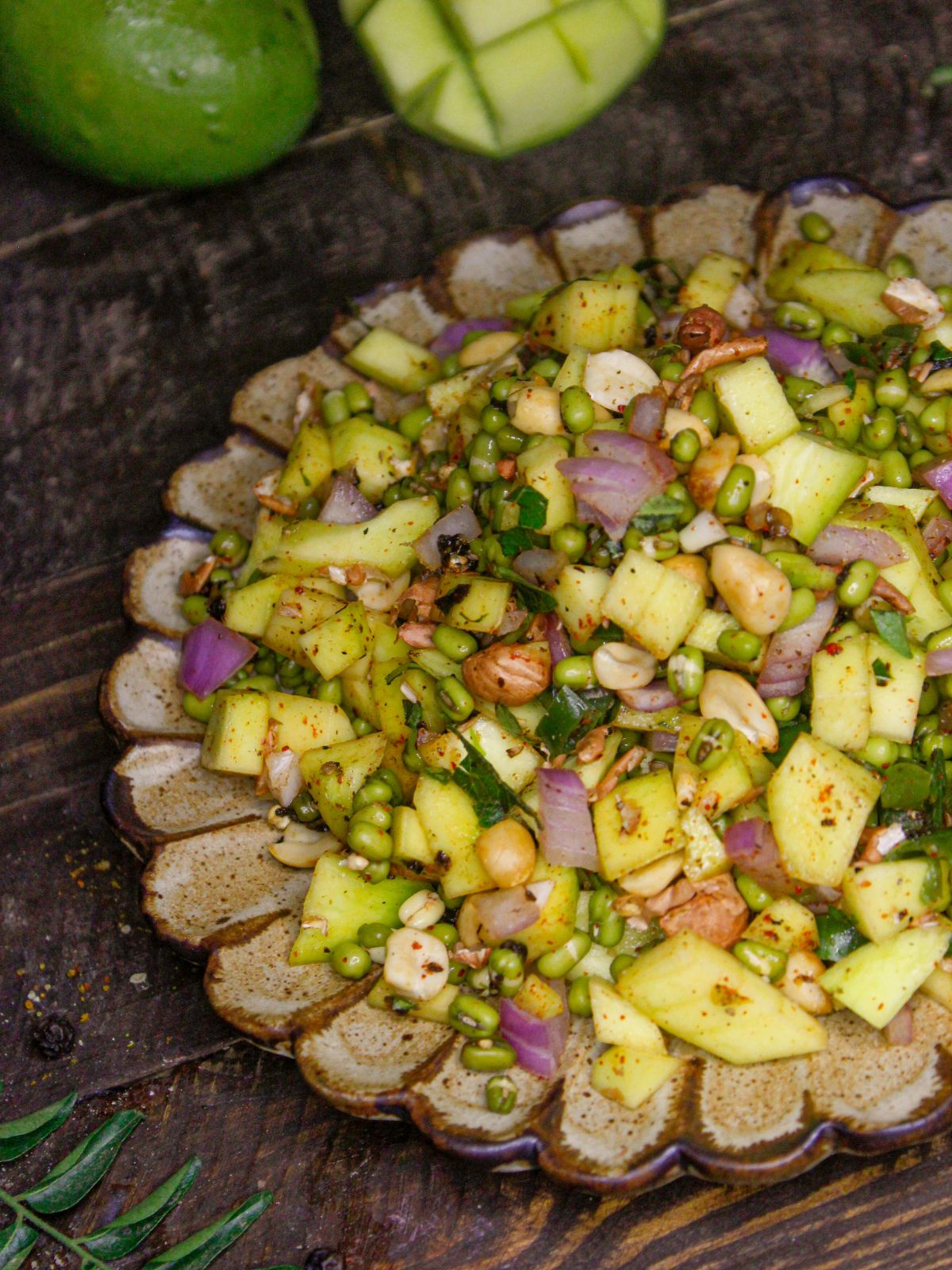 Top view half plate image of South Indian Raw Mango Salad with Sprouts