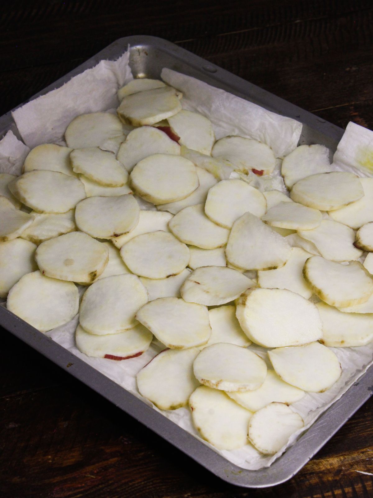 Remove the potato slices in a big container