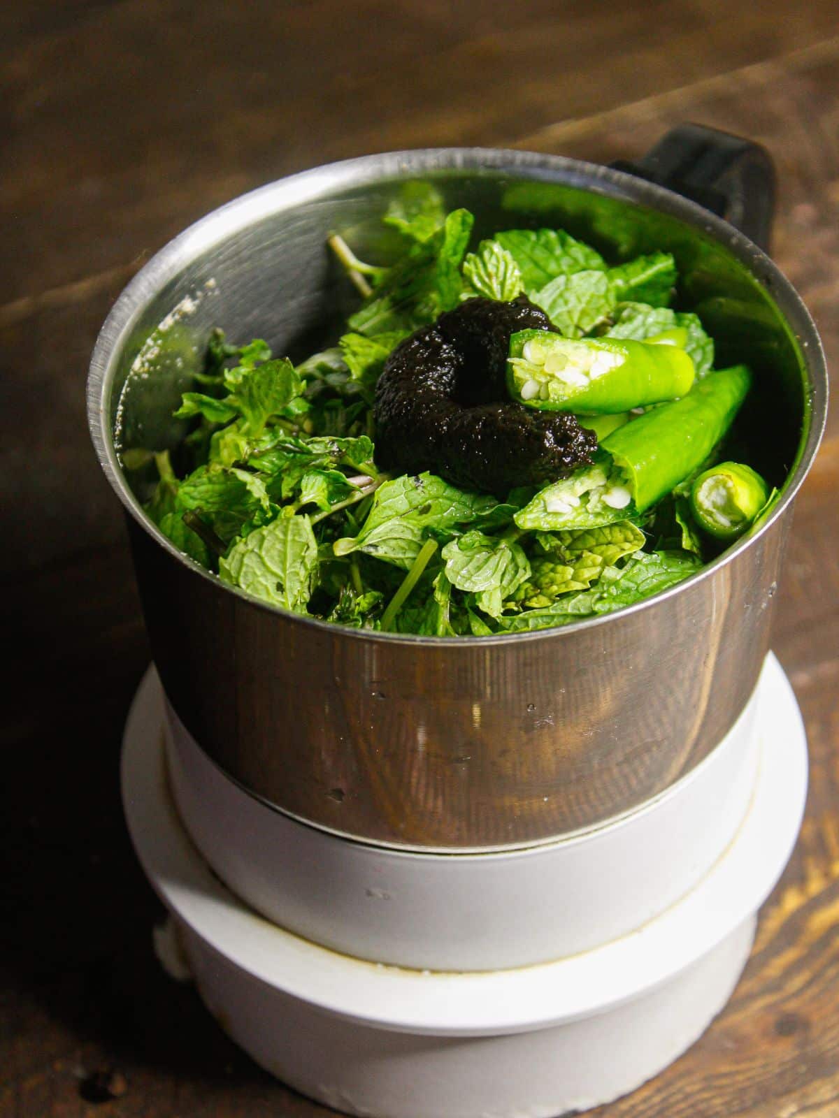 Take all the ingredients for the chutney in a grinder 