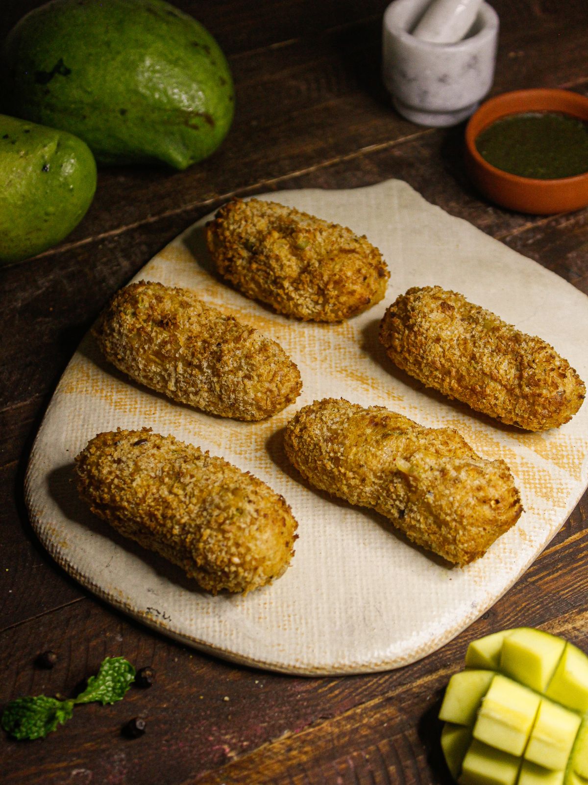 Crunchy and hot Air Fried Raw Mango Cutlets with Tamarind Chutney 