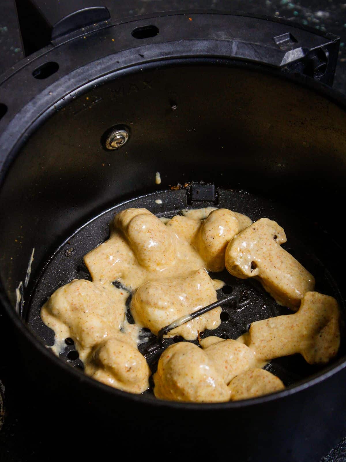 Transfer the mushrooms into air fryer and cook well