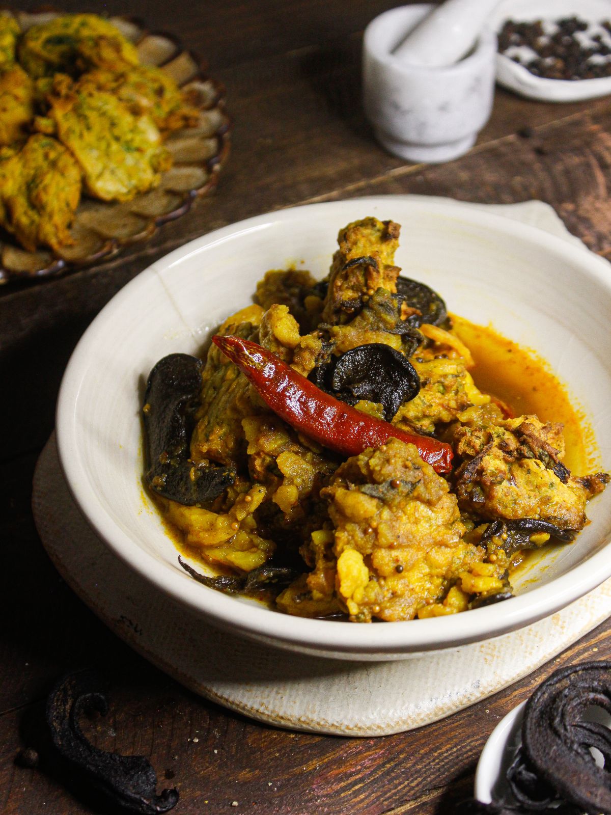 Assamese Boror Tenga: Sour Curry with Fritters ready to enjoy with rice or rotis 