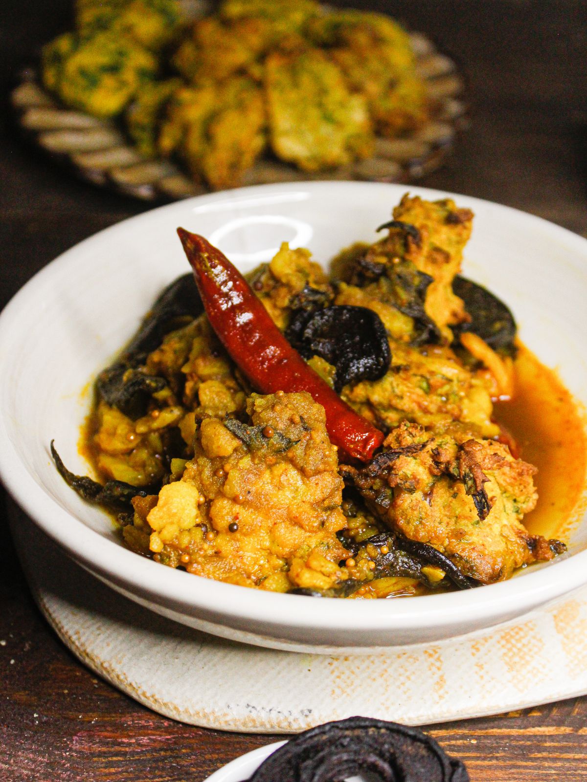 Hot and spicy Assamese Boror Tenga: Sour Curry with Fritters