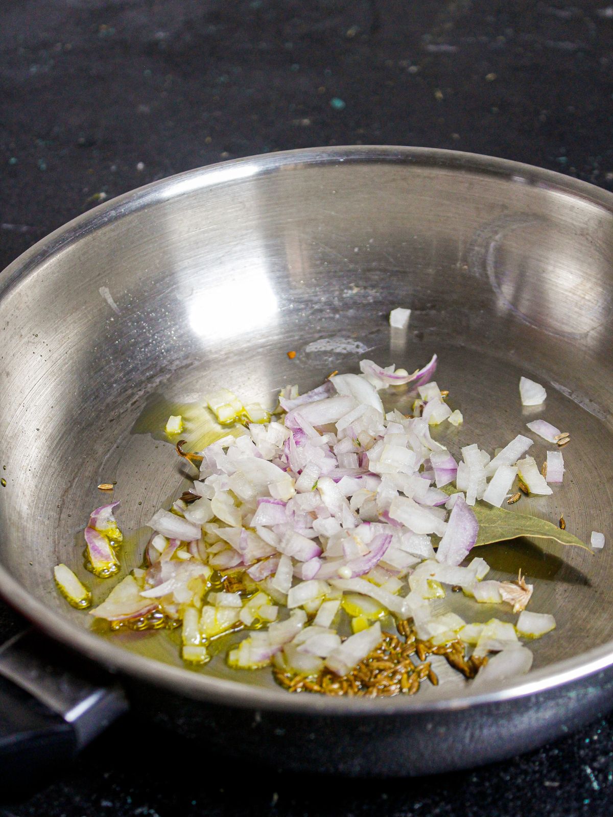 Add chopped onions to the saute 