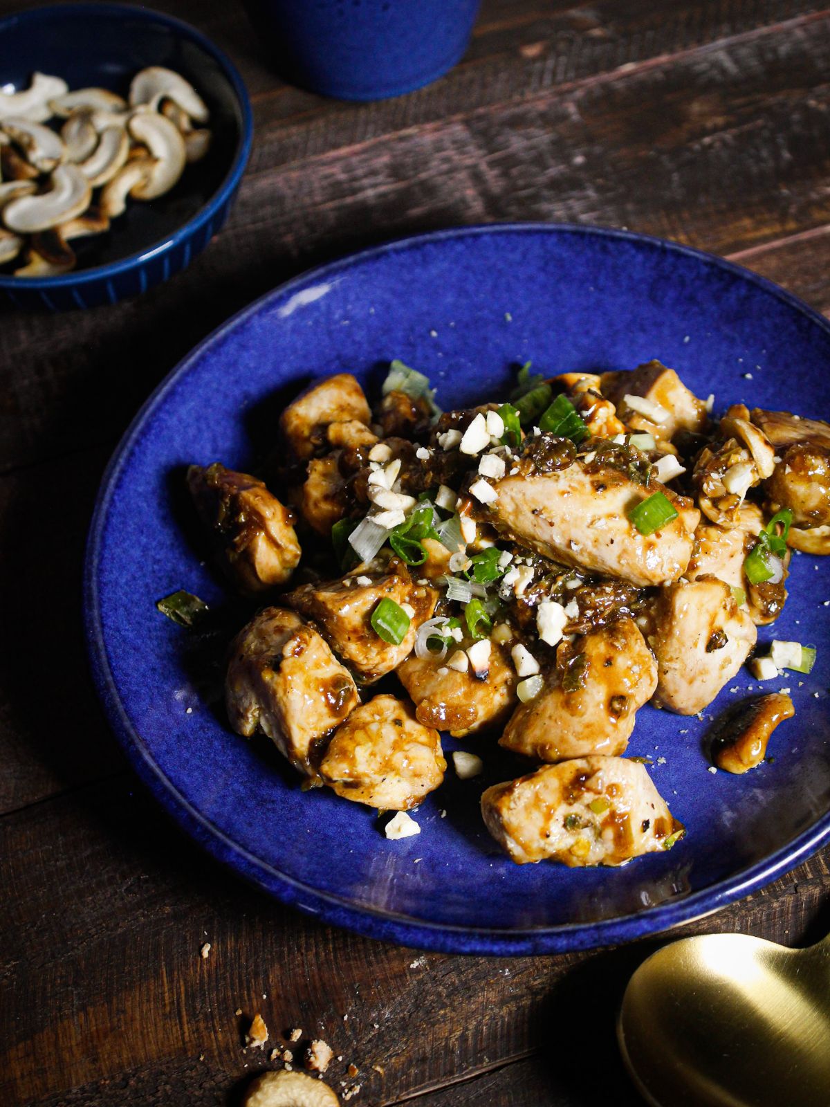 Delicious Cashew Chicken served on a blue plate 