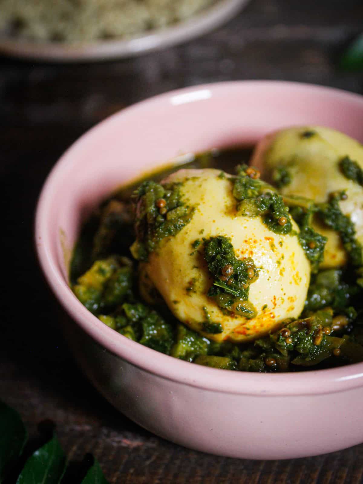 Side view image of Egg Curry with Curry Leaves Puree