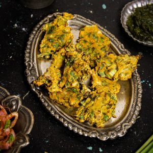 Featured Img of Air Fried Spring Onion Pakoras with Green Chutney and Salad
