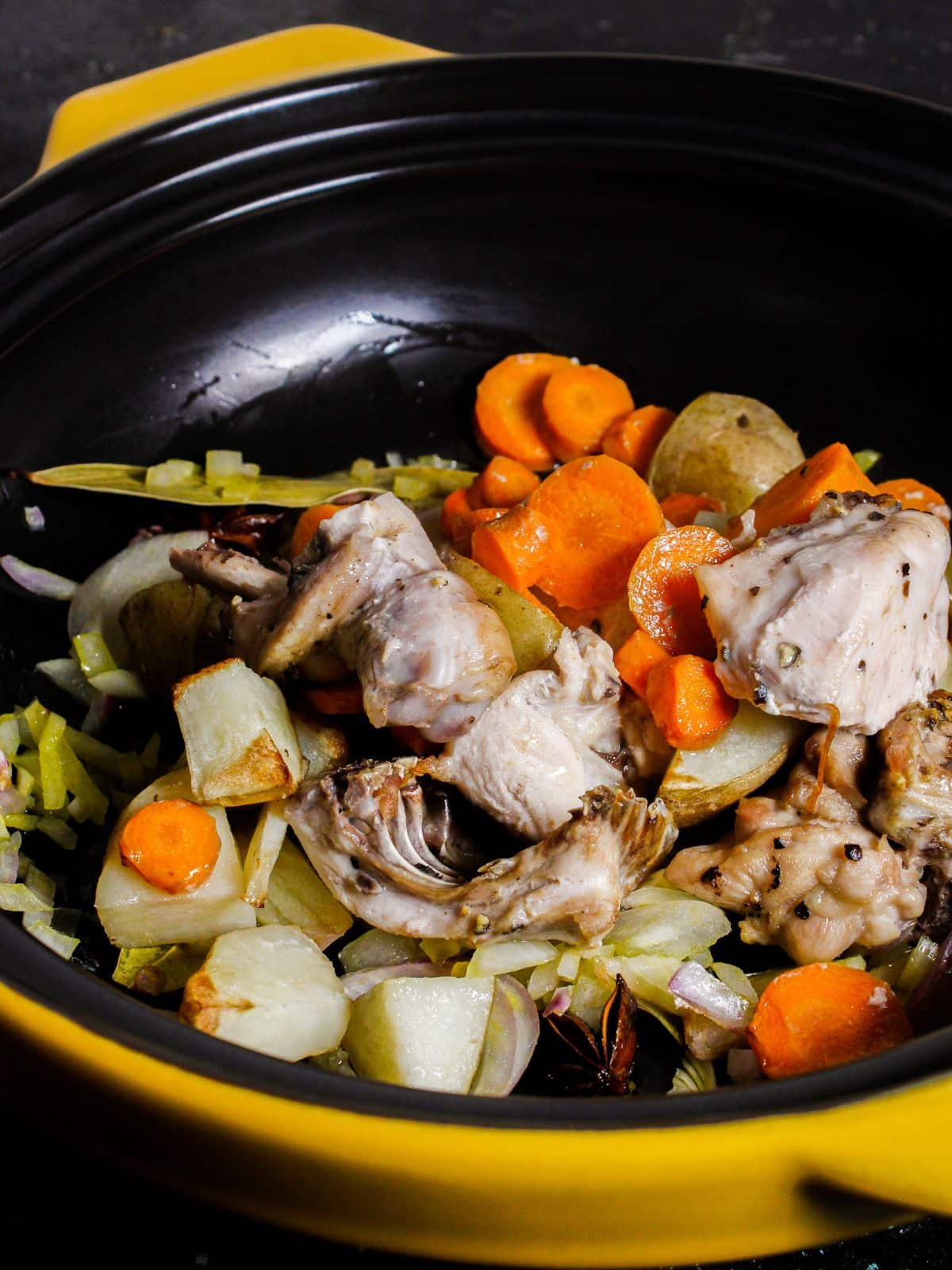 Add prepared chicken into the pan and mix well