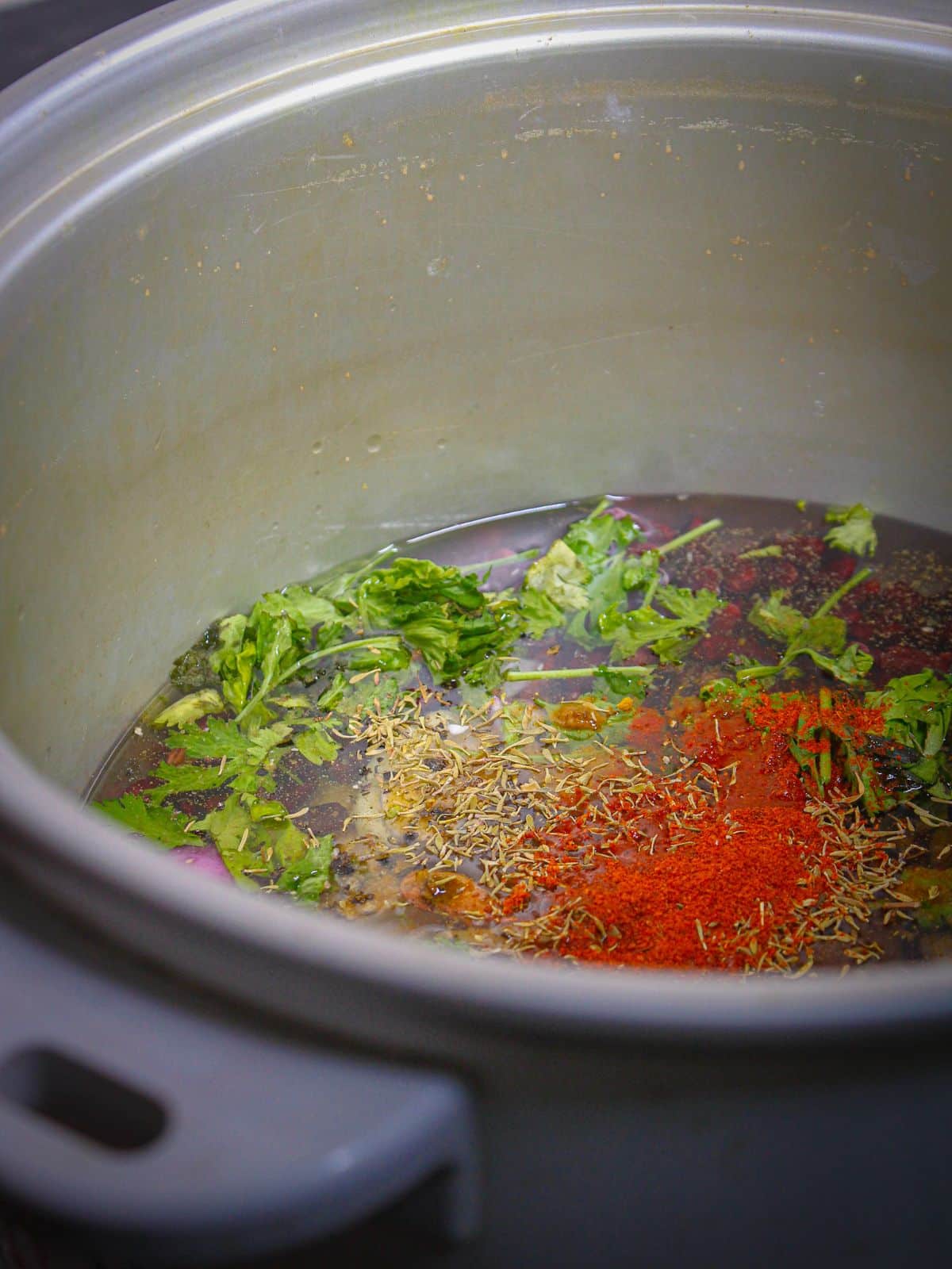 Add red paprika to the pot 