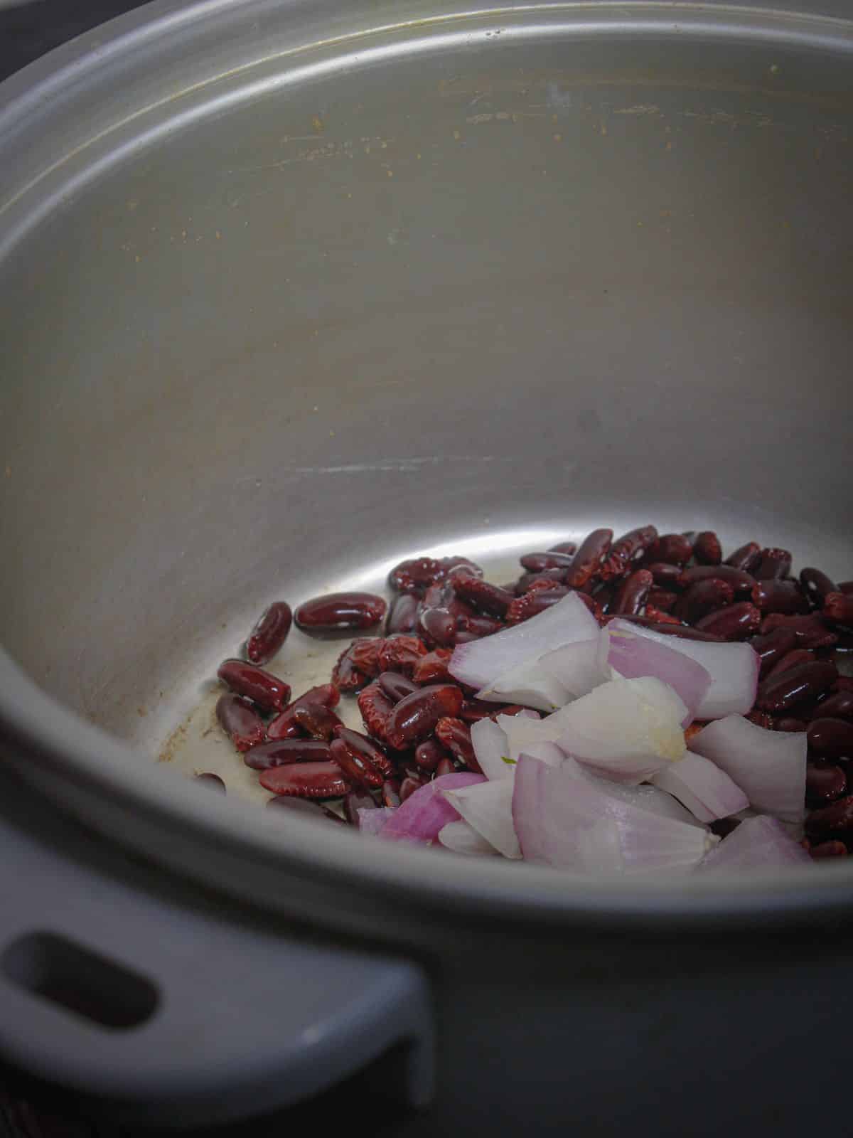 Add chopped onions to the pot 