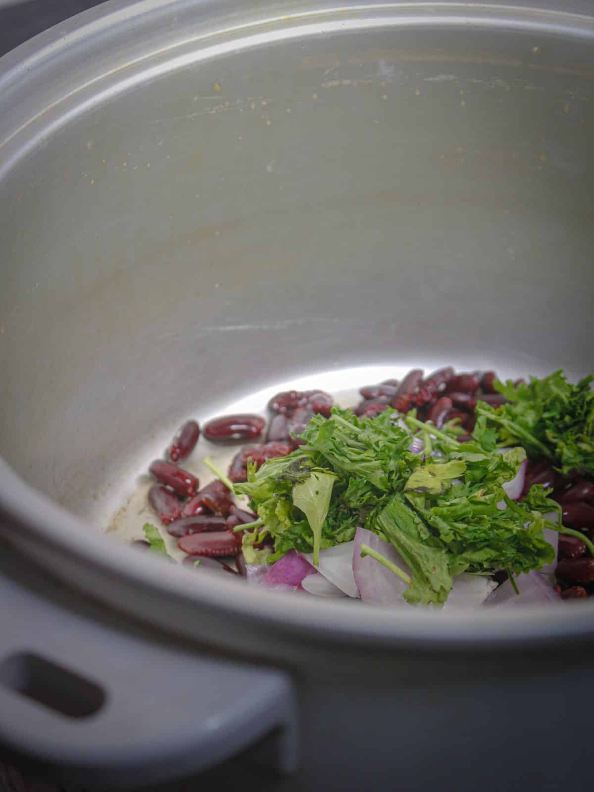 Add coriander leaves to the pot 