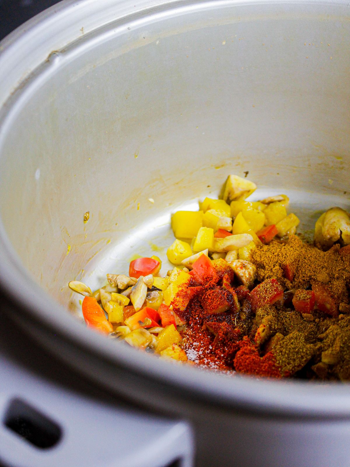 Add all the powdered spices to the pot and saute 