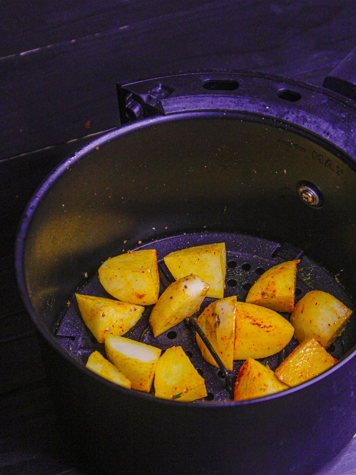 Air fry the marinated potatoes and keep aside 