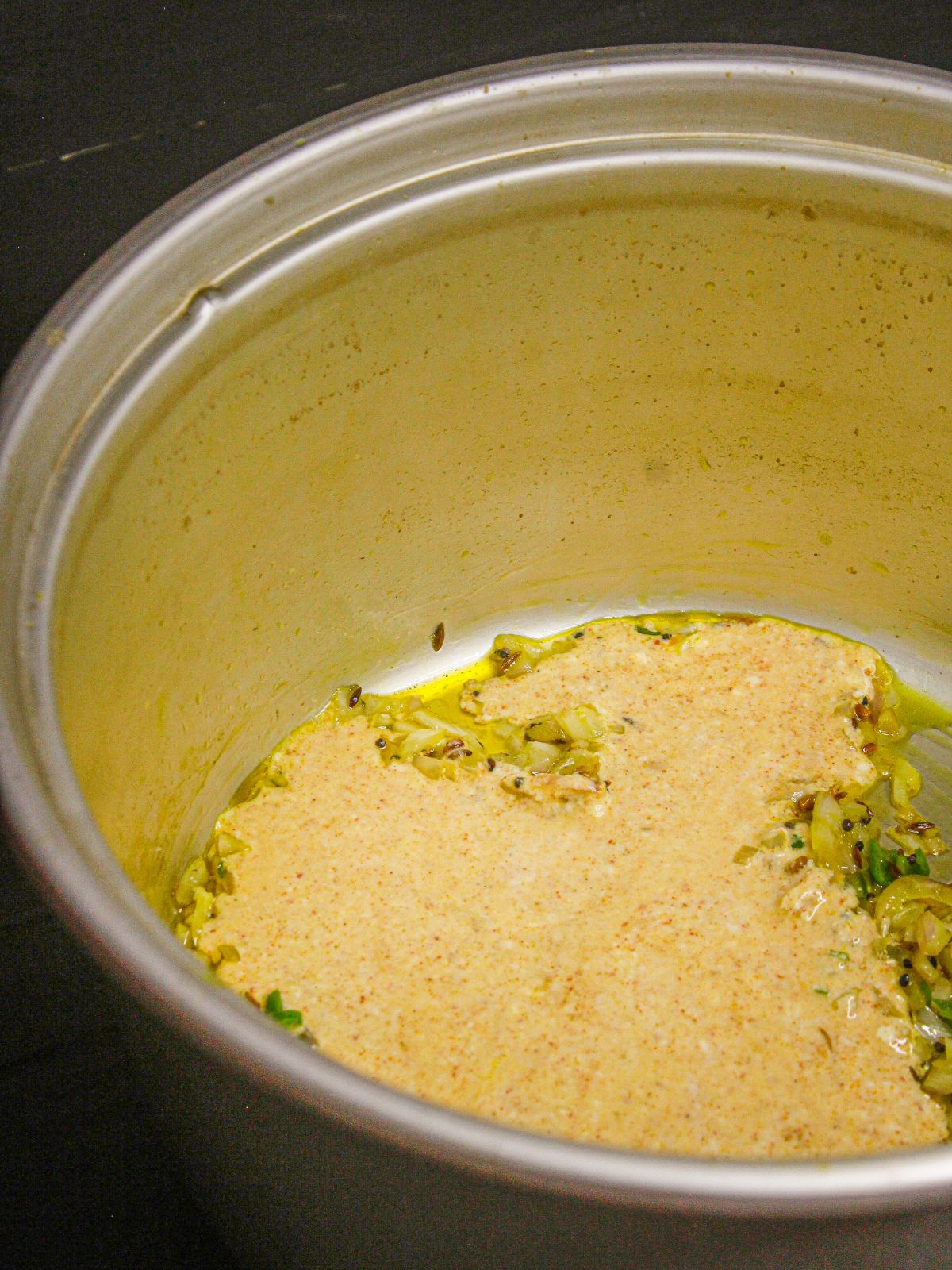 Pour the curd mixture into instant pot and saute 