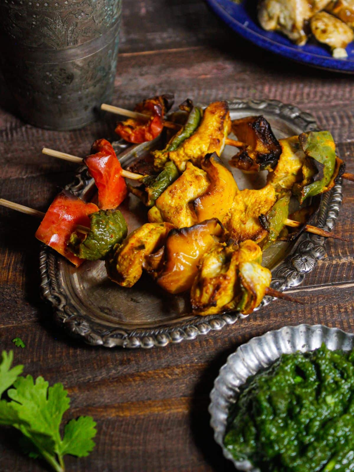 Hot and delicious Air Fried Spicy Chicken Kebabs served with chutney and onion salad 