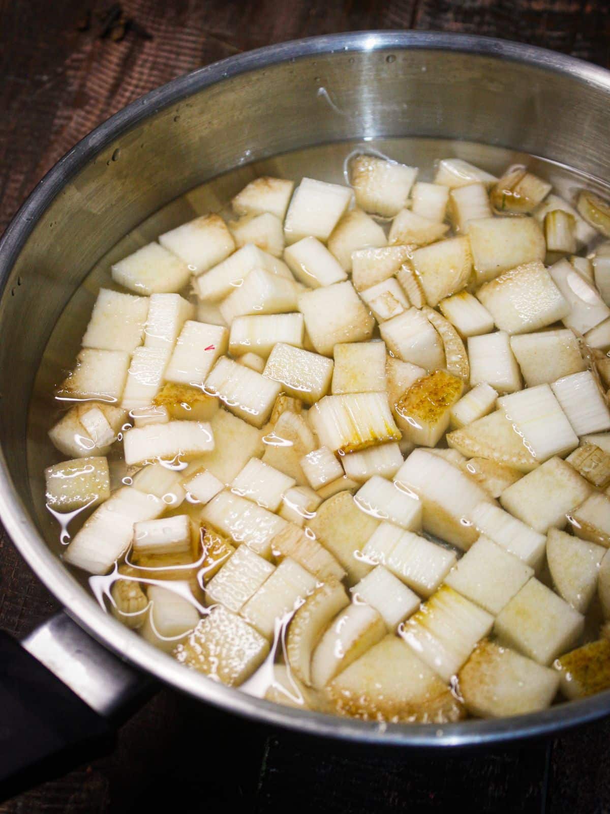 Pieces of bananas boiling in a pan 