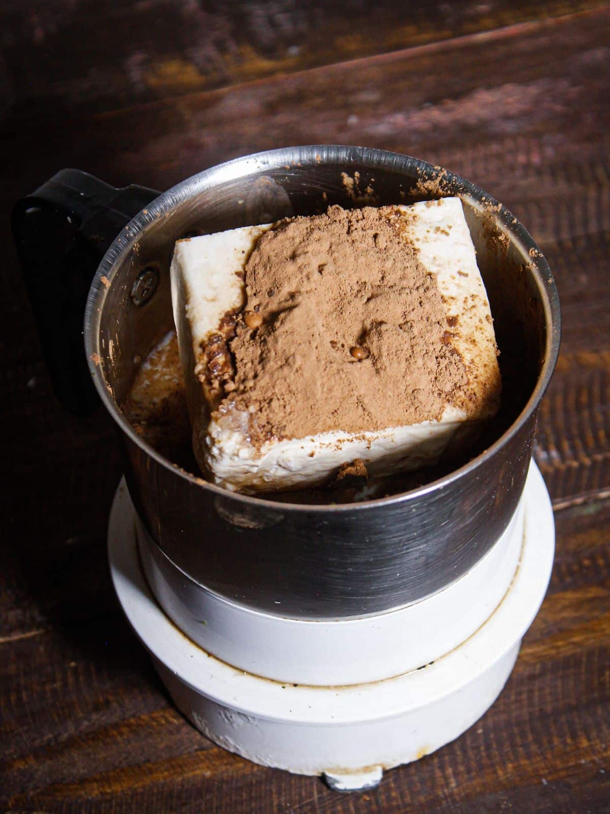 Take tofu, cocoa powder & sugar in a blender 