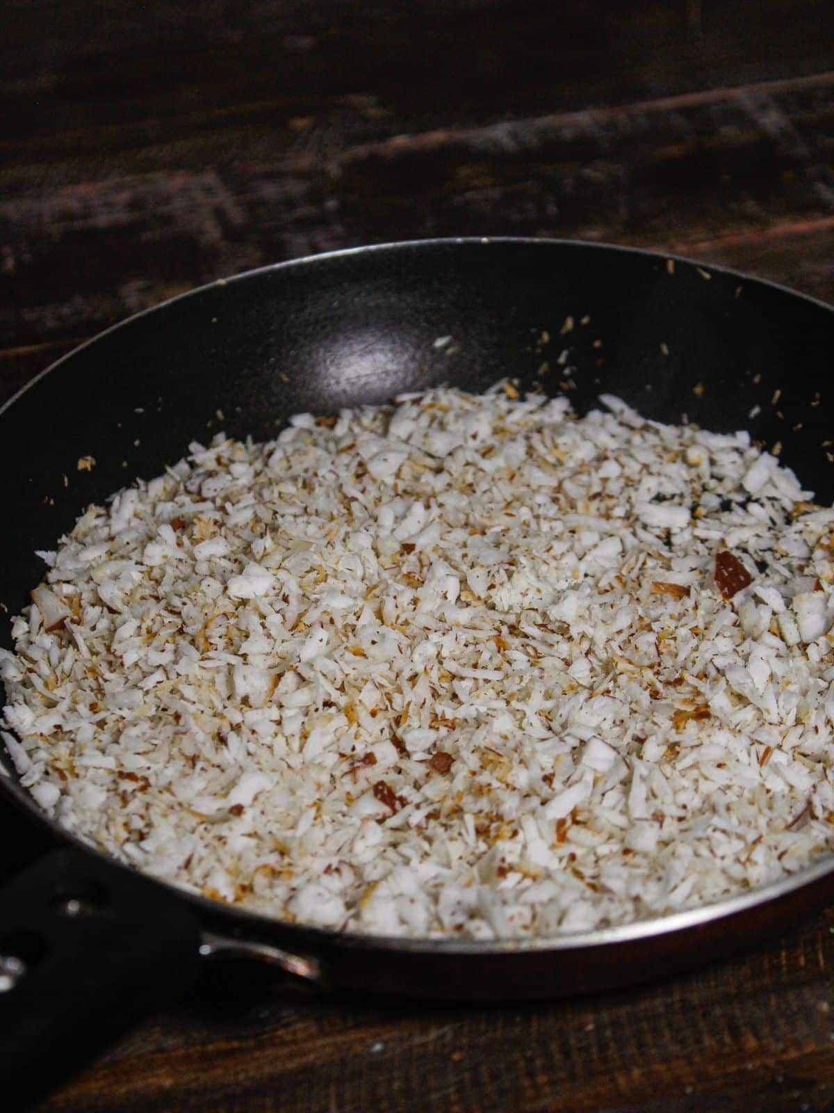 Roast the shredded coconut and keep it aside to cool down 