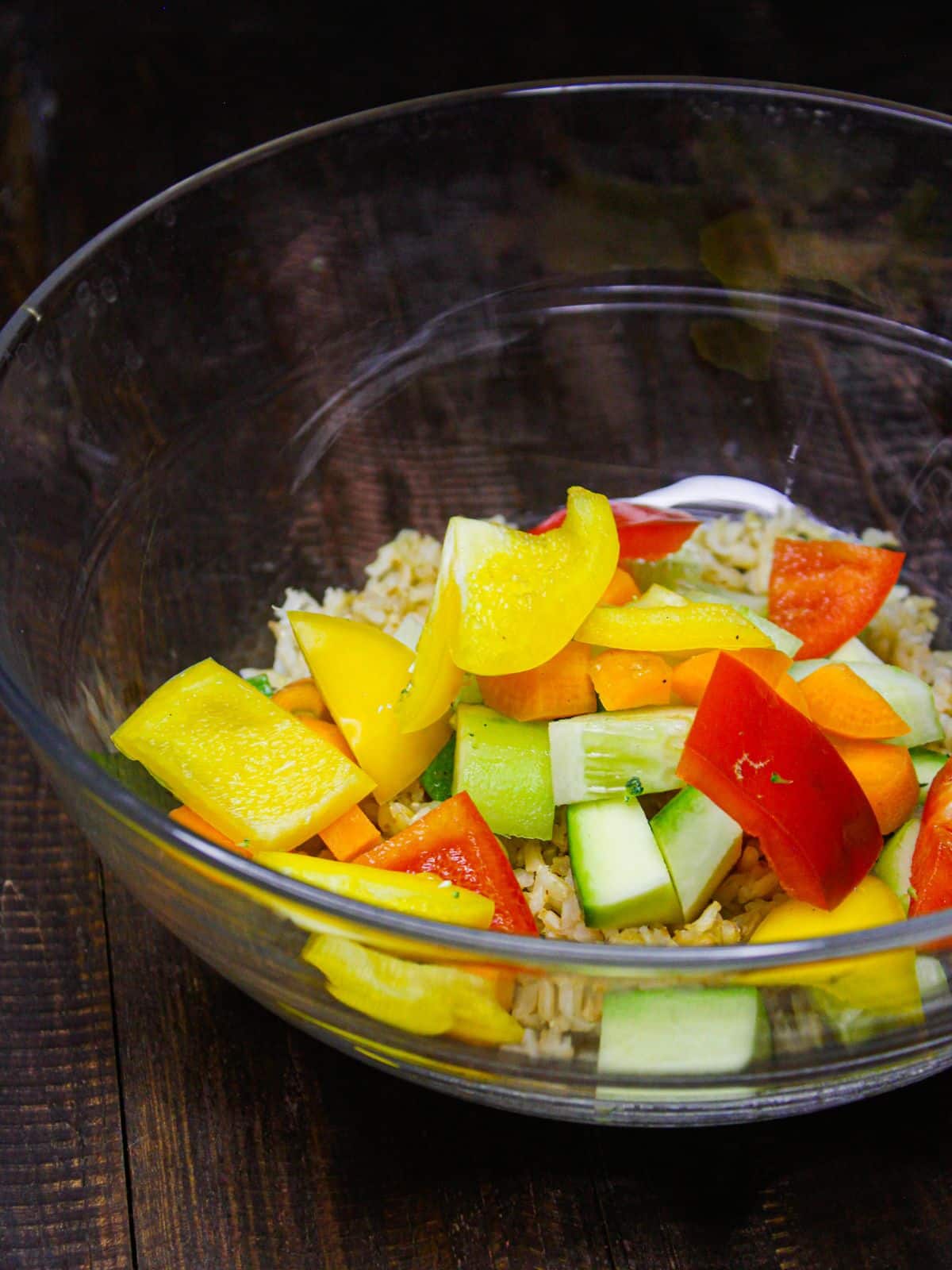 Add chopped capsicums into the bowl