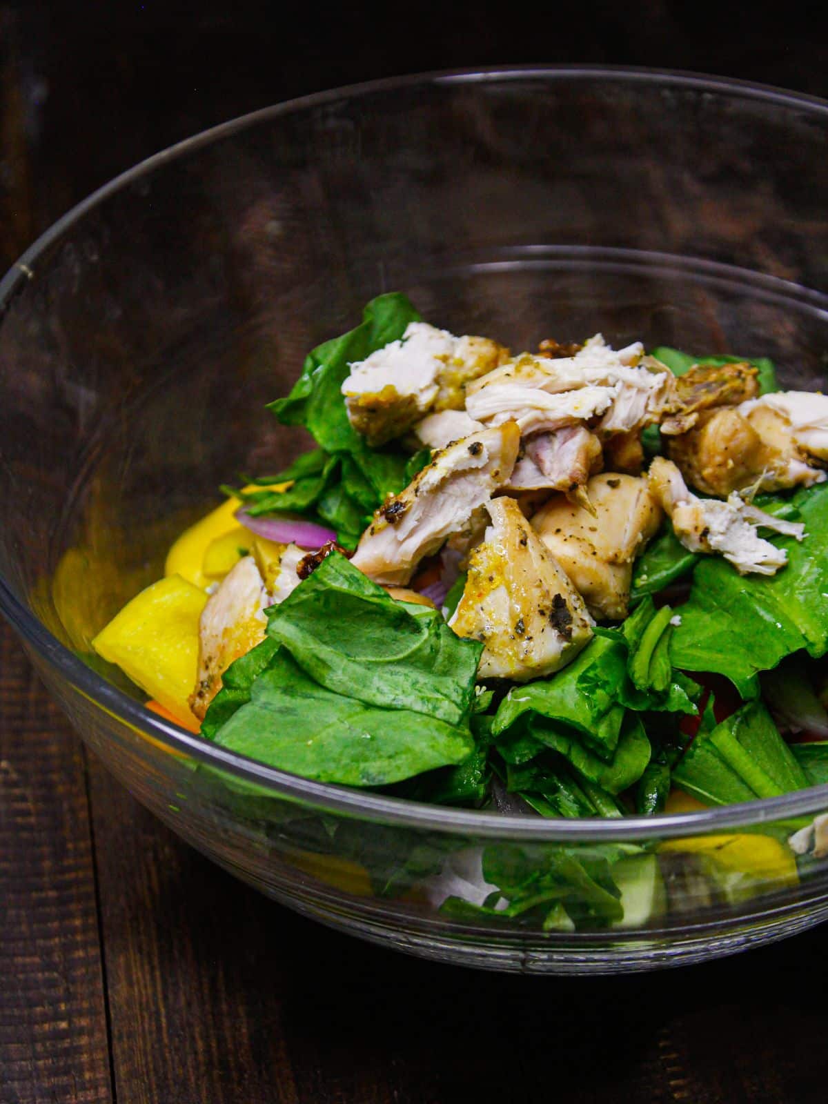 Add air fried chicken pieces into the bowl 