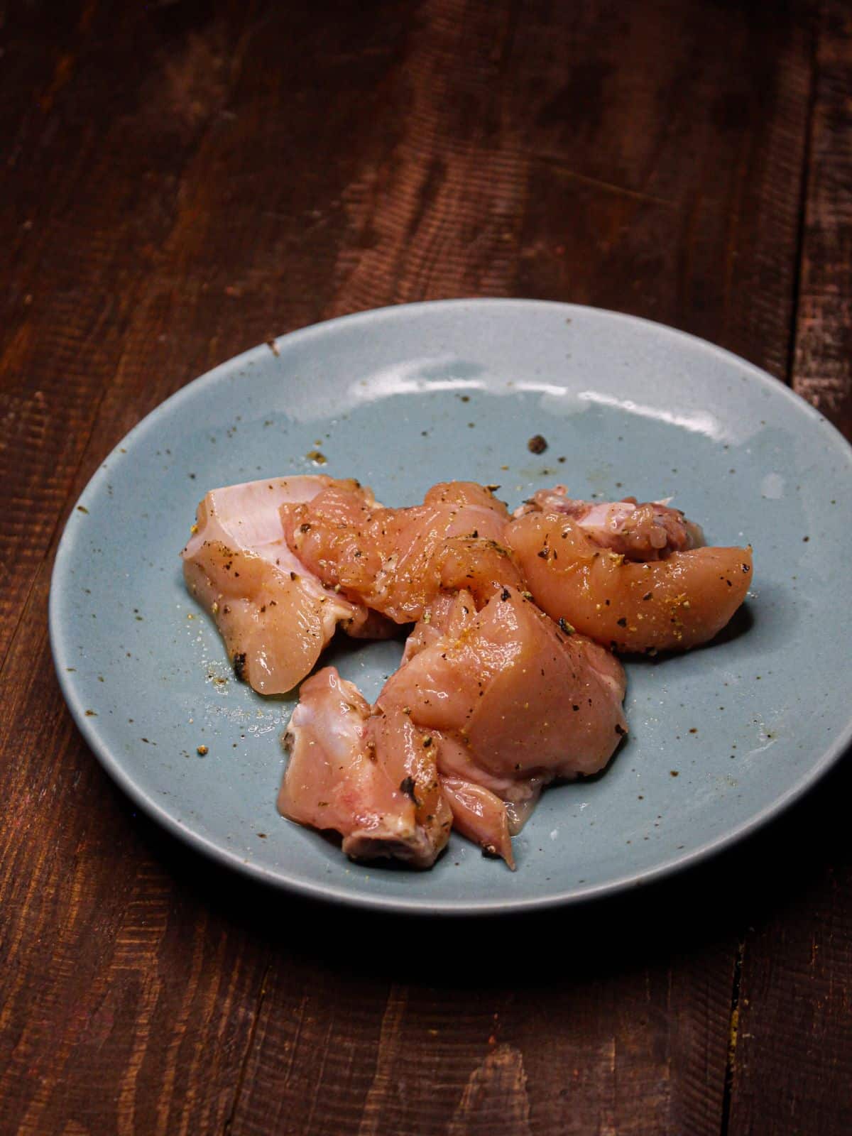 Marinate chicken pieces with spices 