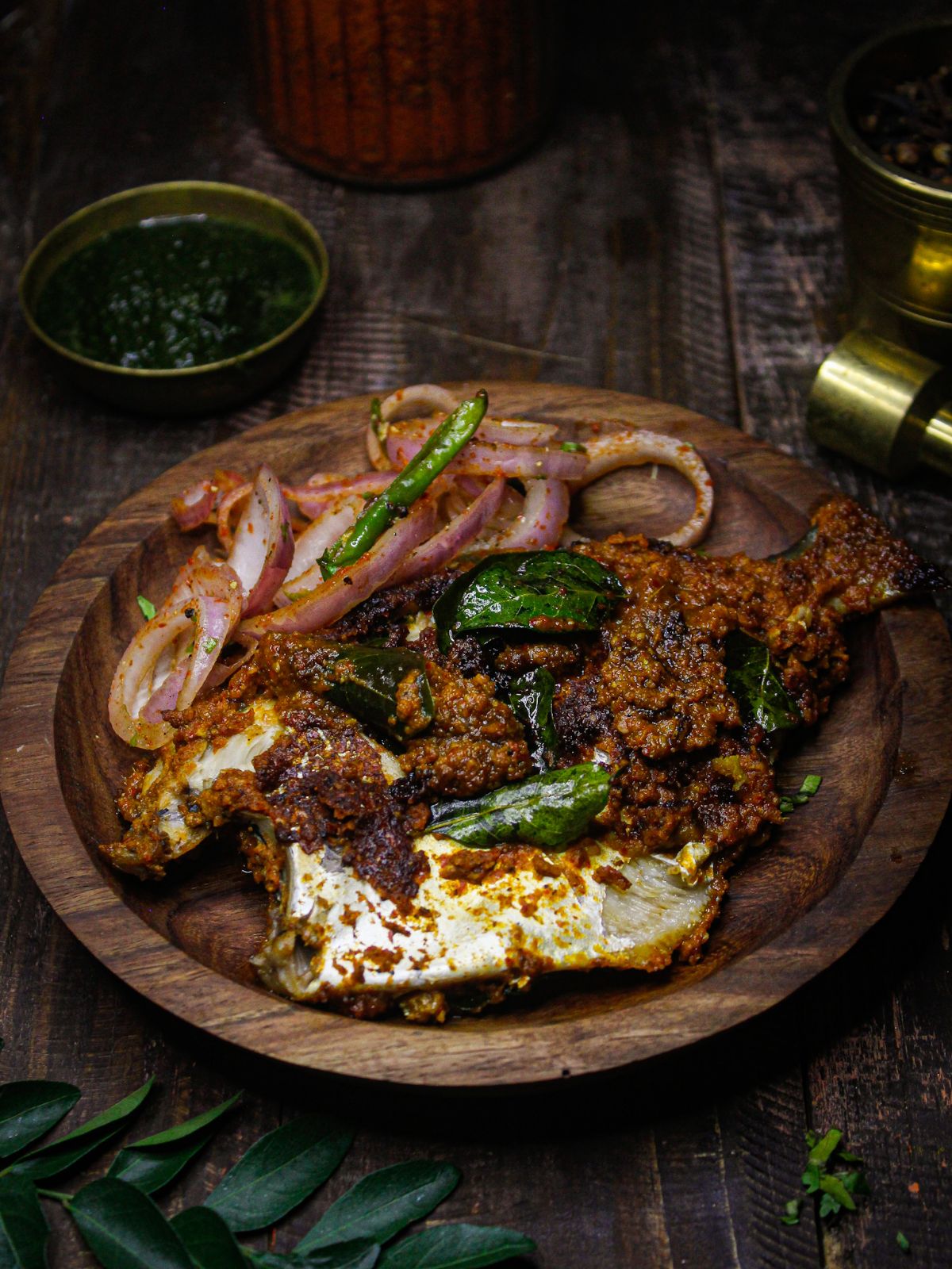 Yummy Pomfret Tawa Fry in Red Paste ready to enjoy with green chutney and onion salad 