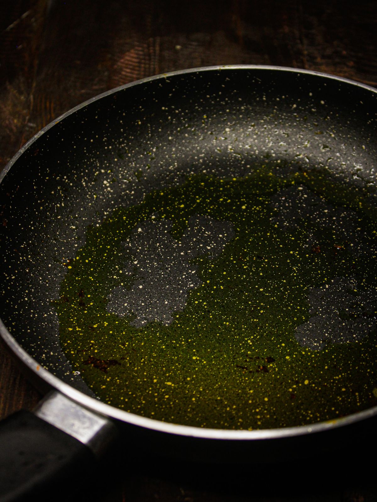 Take oil into the pan and heat it 